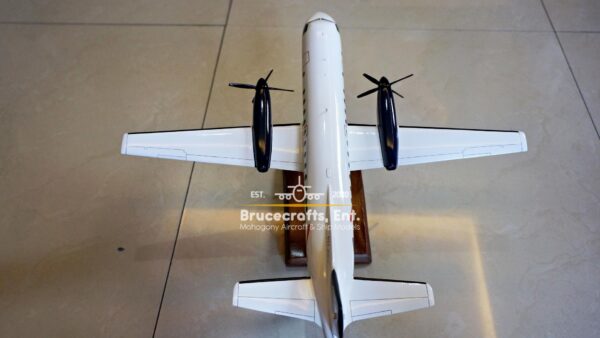 Model of Saab 340 Rex Airlines Aircraft with detailed craftsmanship.